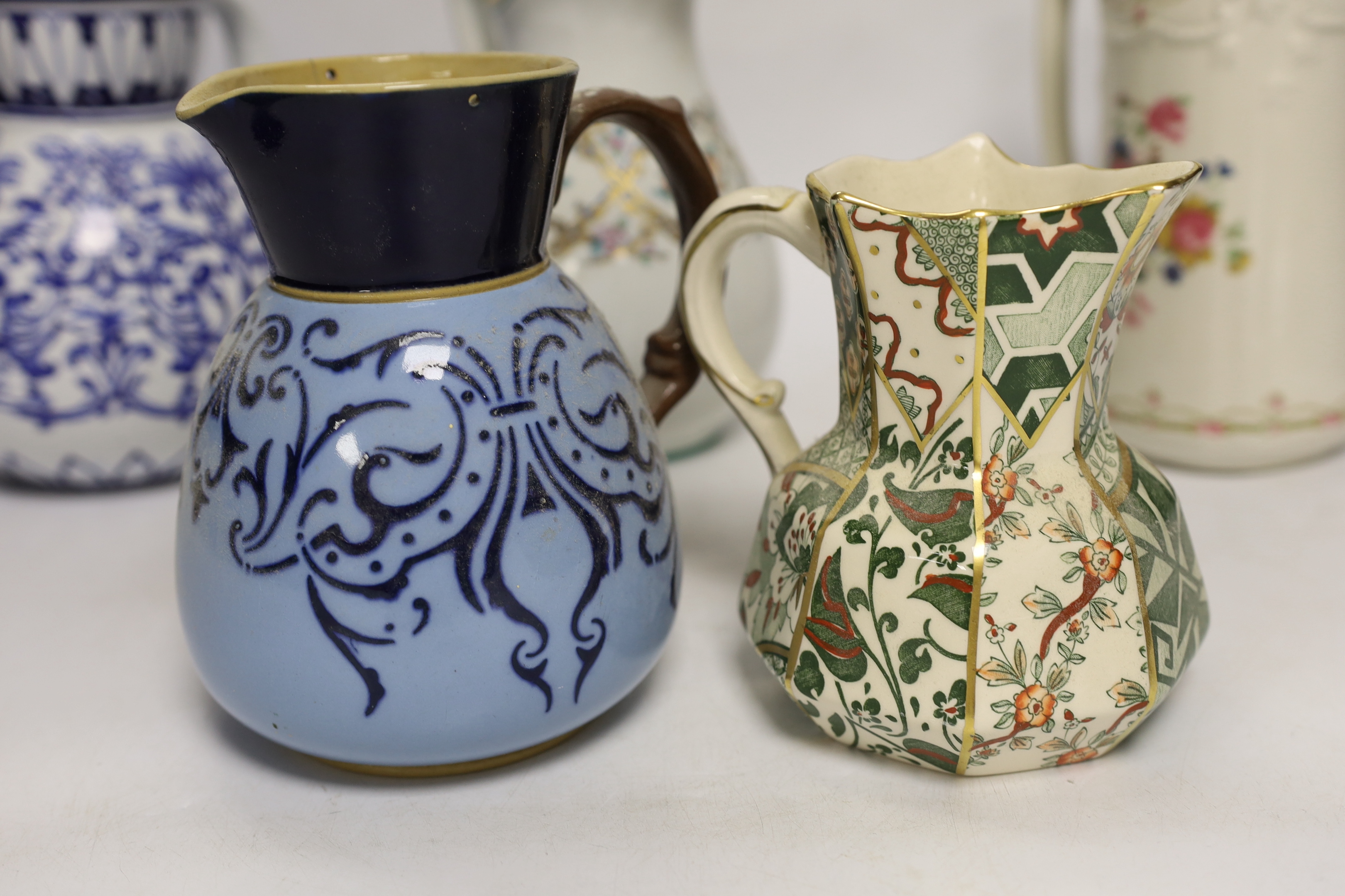Seven late 19th century and early 20th century jugs, tallest 19cm